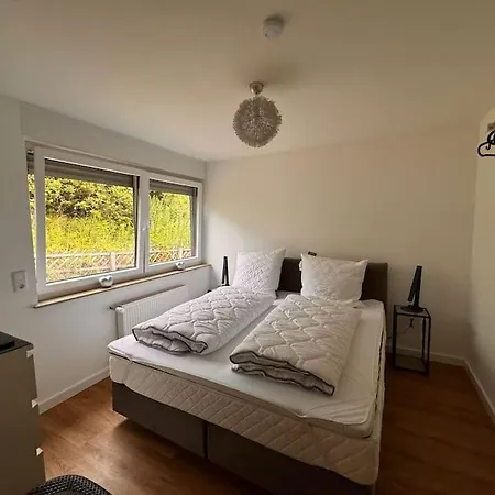 - Haus Am Fluss Apartman