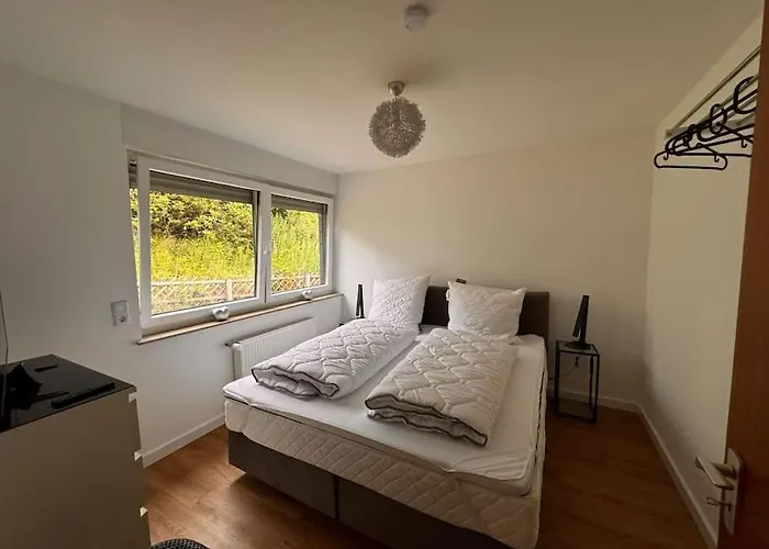 - Haus Am Fluss Apartman